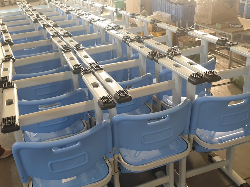 Student desk-and-chair units lined up after assembly